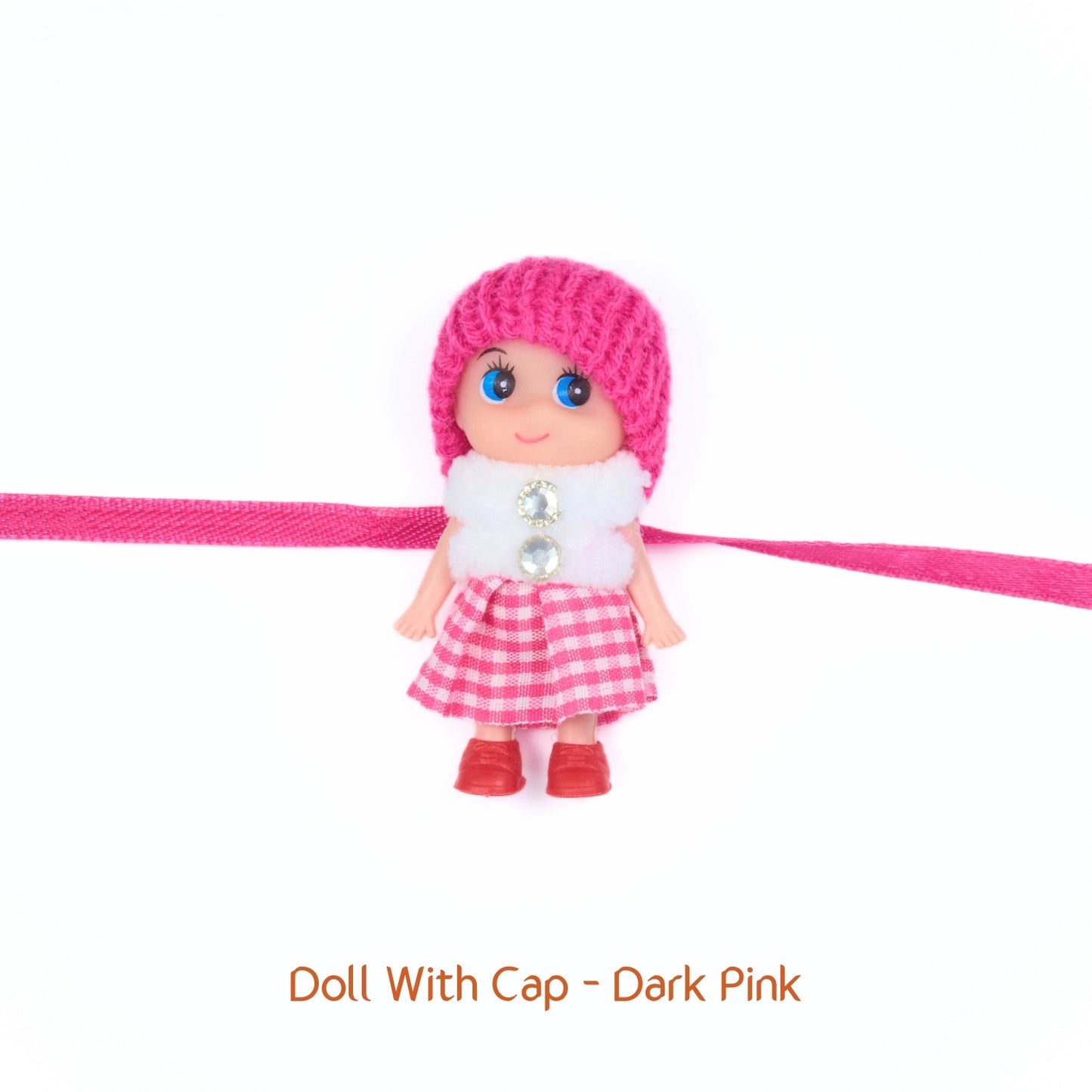 Bright pink Doll Rakhi with glitter buttons and red shoes – perfect for little girls this Raksha Bandhan