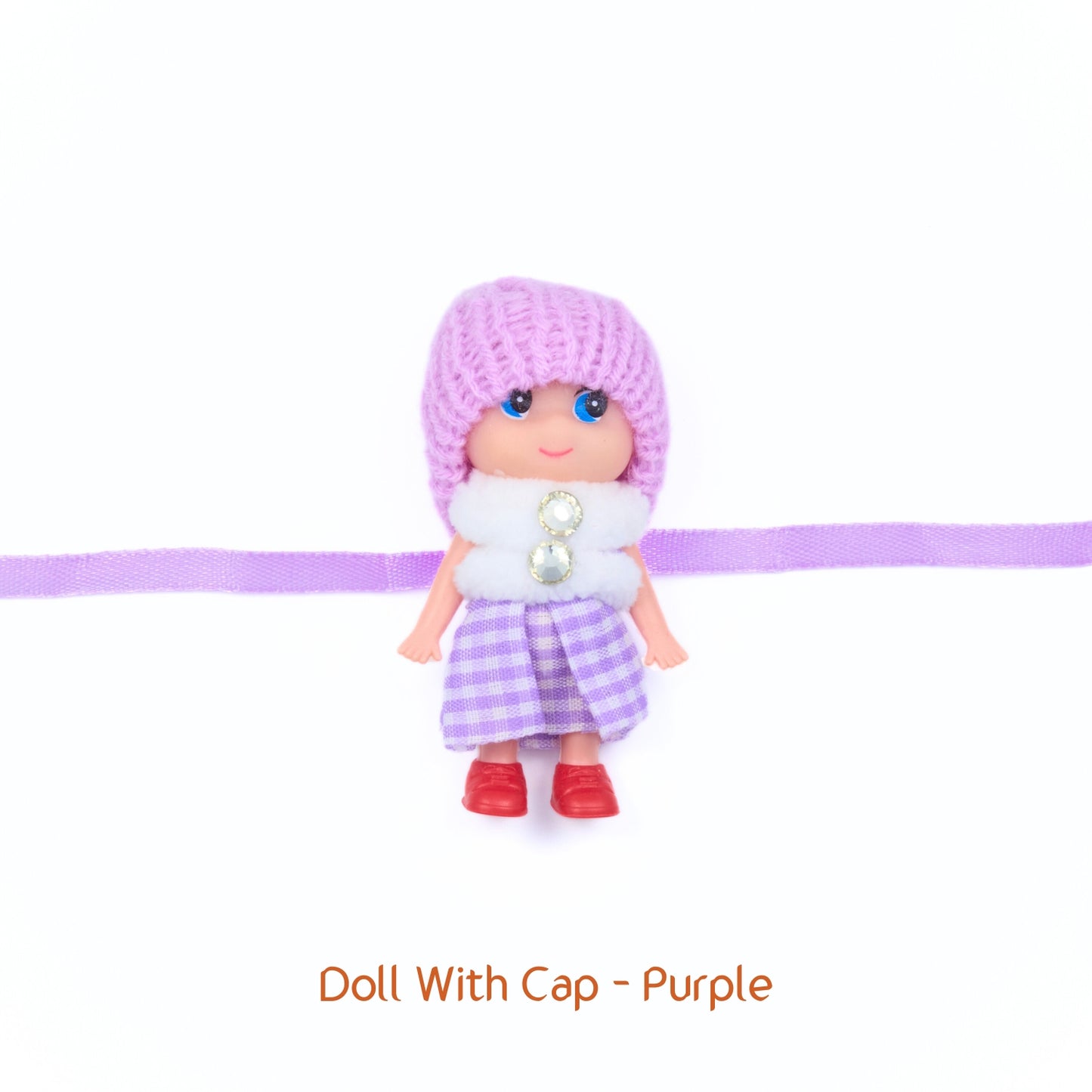 Purple Doll Rakhi with soft cap and cute detailing – handmade-style Rakhi for kids or sisters