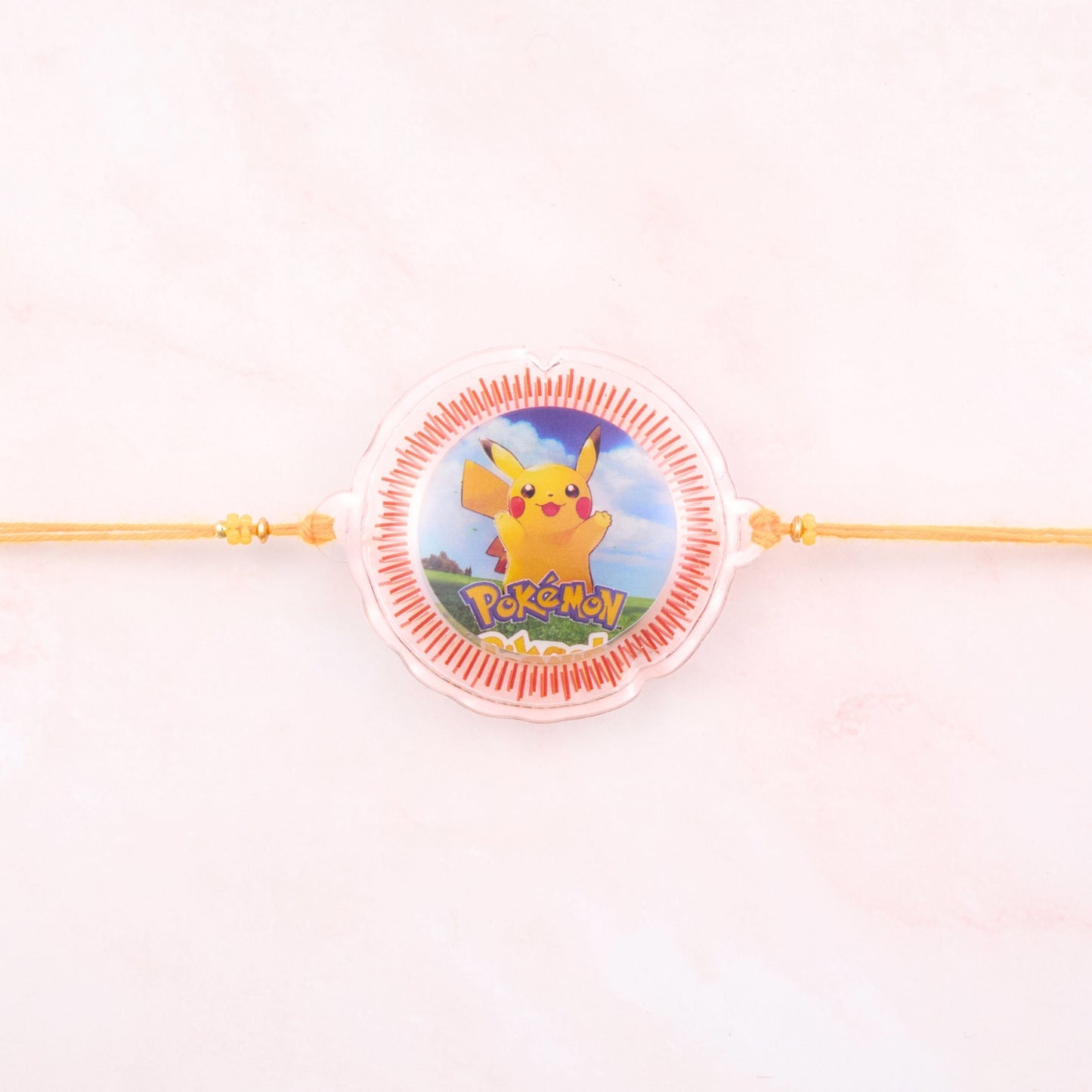 Pikachu Pokémon Rakhi for kids with yellow thread – lightweight Rakhi for younger brothers, perfect Raksha Bandhan gift shipped from Sydney, Australia.