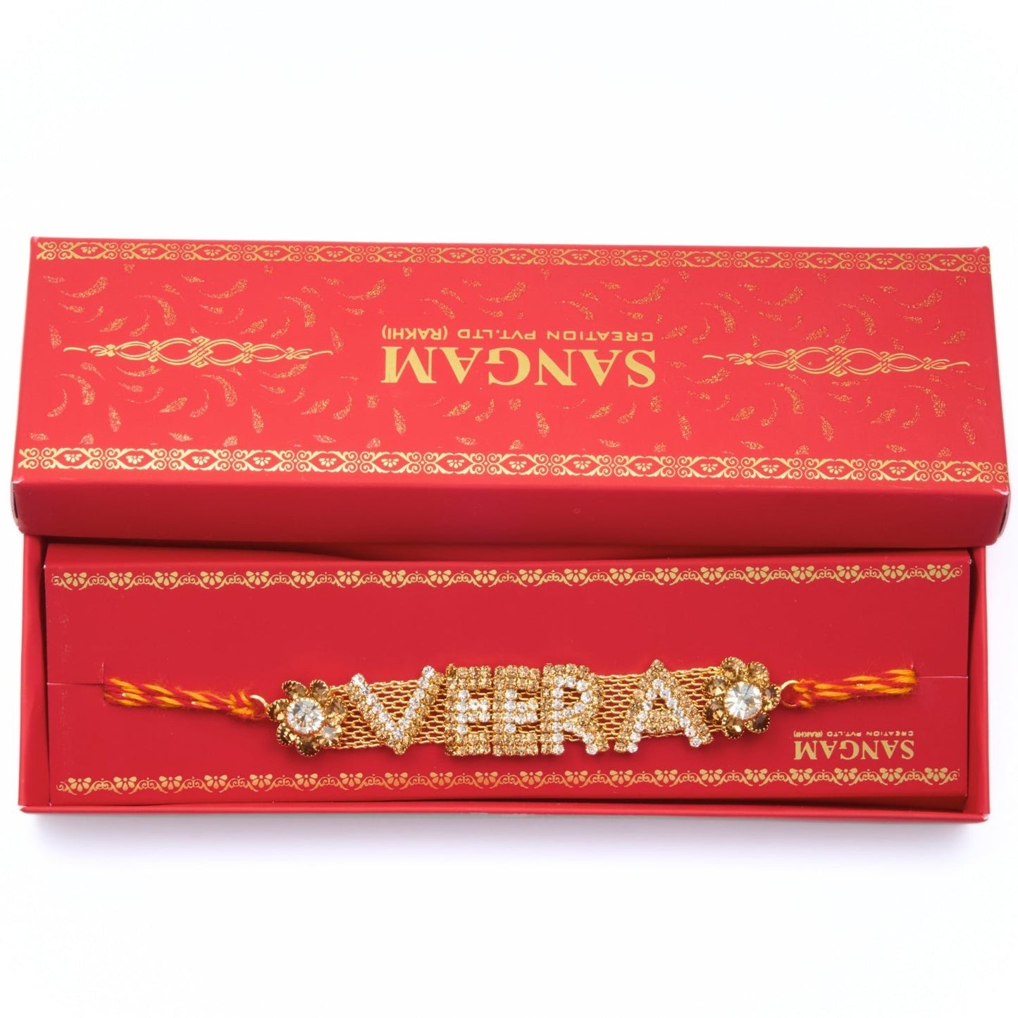 Veera Rakhri with gold finish and rhinestones on red-yellow thread in a beautiful box β Rakhri for Brother