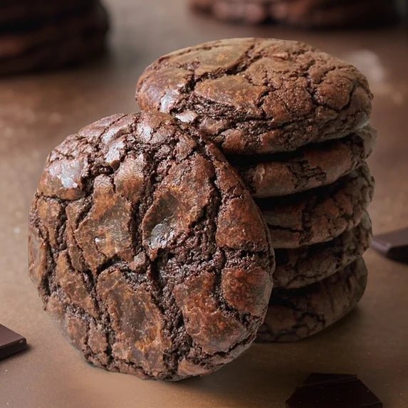 Stack of soft and fudgy brownie cookies showing texture
