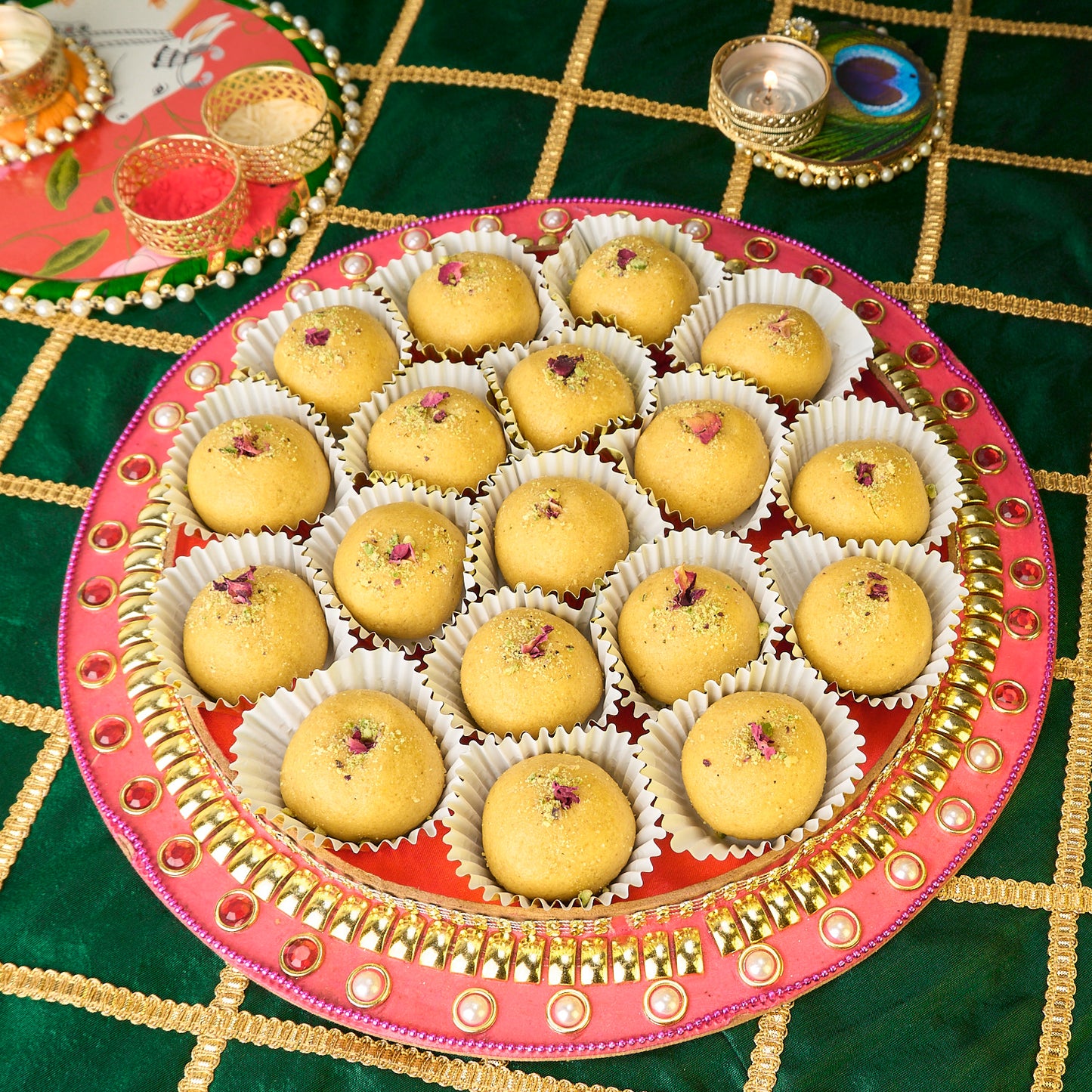 Traditional Besan Laddoo festive platter with rose petal garnish Punjabi style Indian sweets serving idea