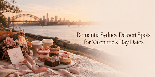 Romantic Sydney Harbour dessert date setup with dessert cups, brownies, flowers and Valentine card at sunset