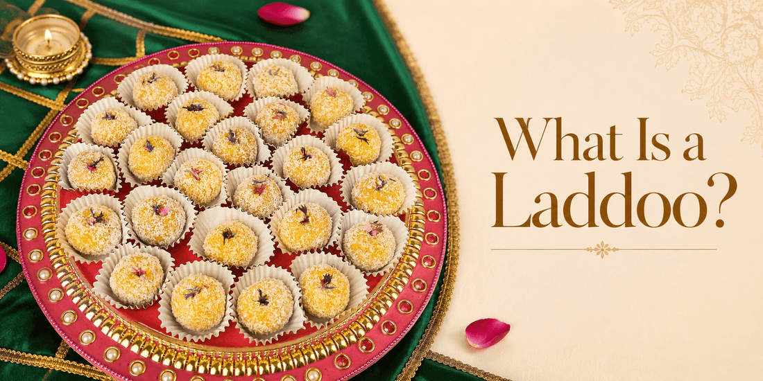 What is a laddoo banner with Mango Coconut Laddoo platter, traditional Indian sweet styling and festive gifting presentation.