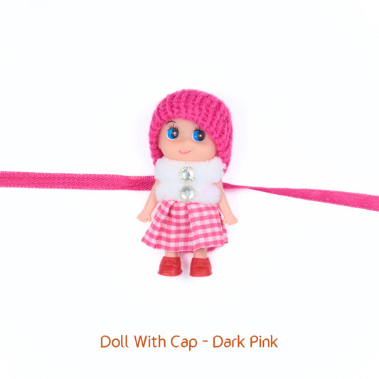 Bright pink Doll Rakhi with glitter buttons and red shoes – perfect for little girls this Raksha Bandhan