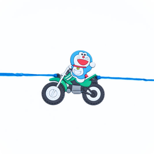 Cartoon Rakhi with Doremon riding green motorbike on blue thread – fun Rakhi design for boys to send australia-wide