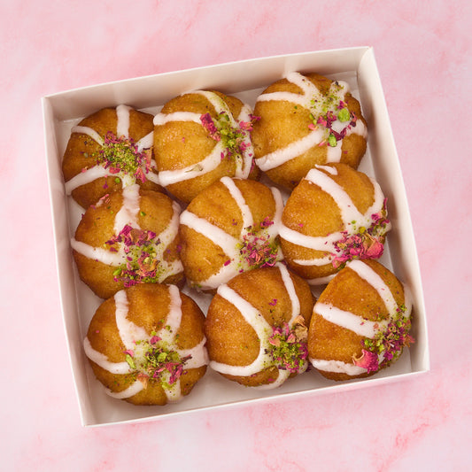 9 pc box of Eggless Mini Gulab Jamun Tea Cakes topped with rose petals and pistachios – Indian sweets Sydney