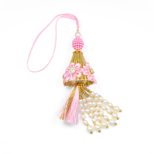Lumba Rakhi online – pink floral rakhi with tassels and pearls for bhabhi. Delivery anywhere in Australia
