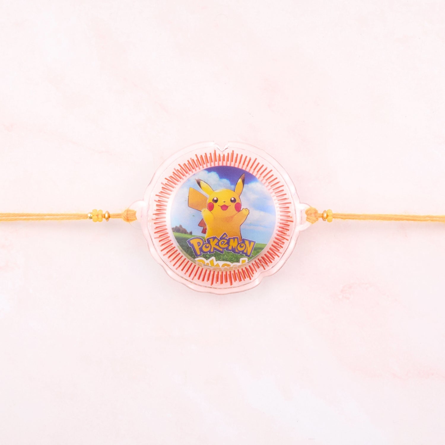 Pikachu Pokémon Rakhi for kids with yellow thread – lightweight Rakhi for younger brothers, perfect Raksha Bandhan gift shipped from Sydney, Australia.