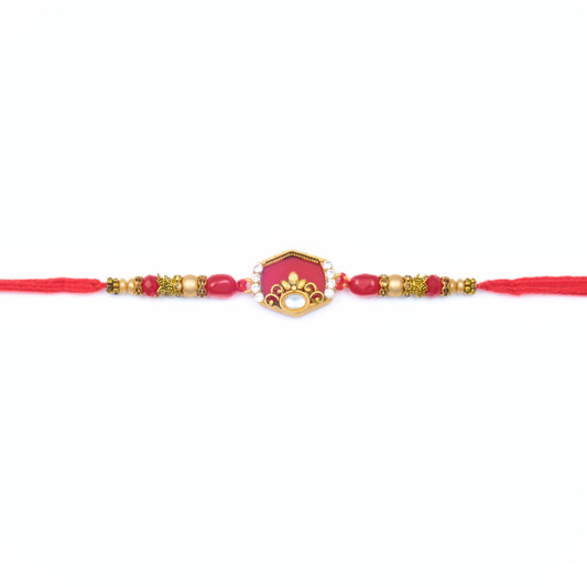 Red kundan-style Rakhi with hexagon centre, gold beads and red thread – Rakhi gift for brother