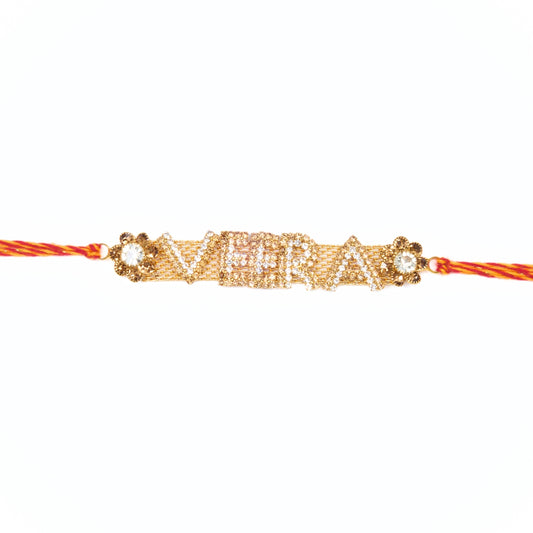 Veera Rakhri with gold finish and rhinestones on red-yellow thread – Rakhri for Brother