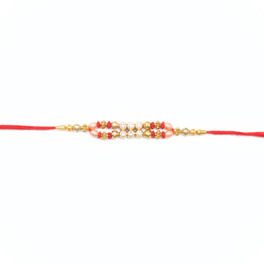 Golden pearl Rakhdi for brother with red thread – Shop Rakhdi online in Australia