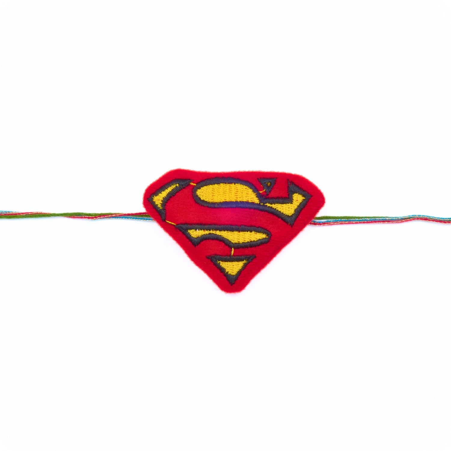 Superman “S” Rakhi in red and yellow – kids rakhi online. Send to Australia from Sydney.