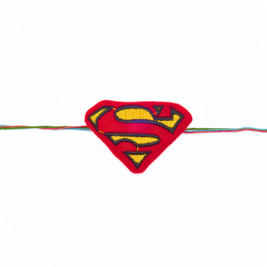Superman “S” Rakhi in red and yellow – kids rakhi online. Send to Australia from Sydney.