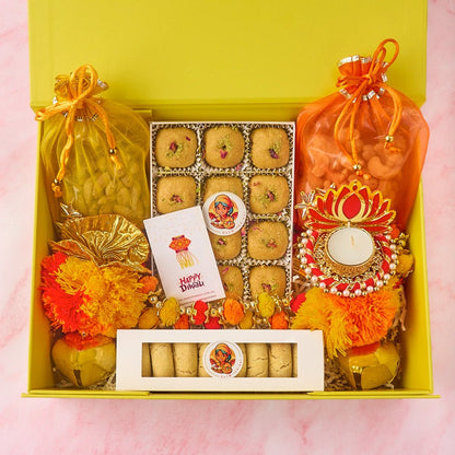 Blossom Bliss Diwali hamper with potli bags, Besan Laddoos, nankhatai, lotus diya and Diwali card