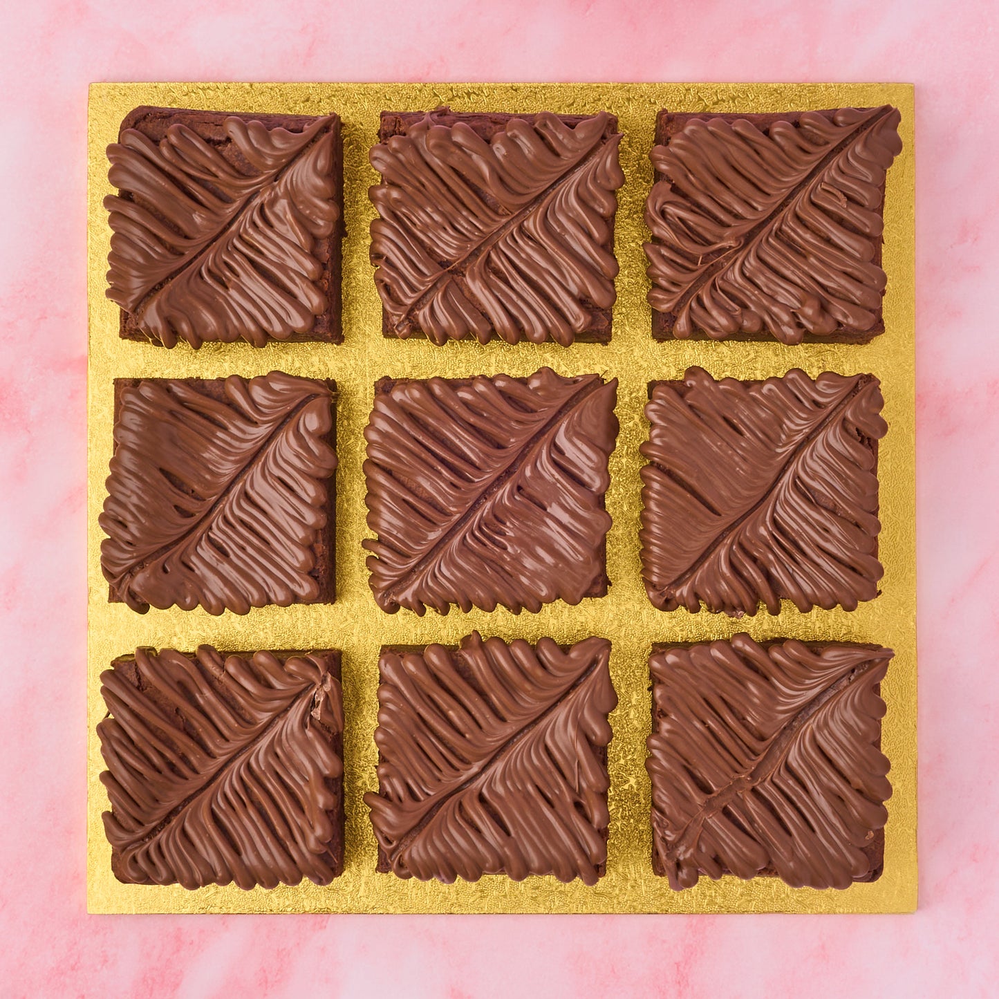 Eggless chocolate brownie gift box with 9 fudgy brownies made using real Belgian couverture chocolate, presented on a golden board