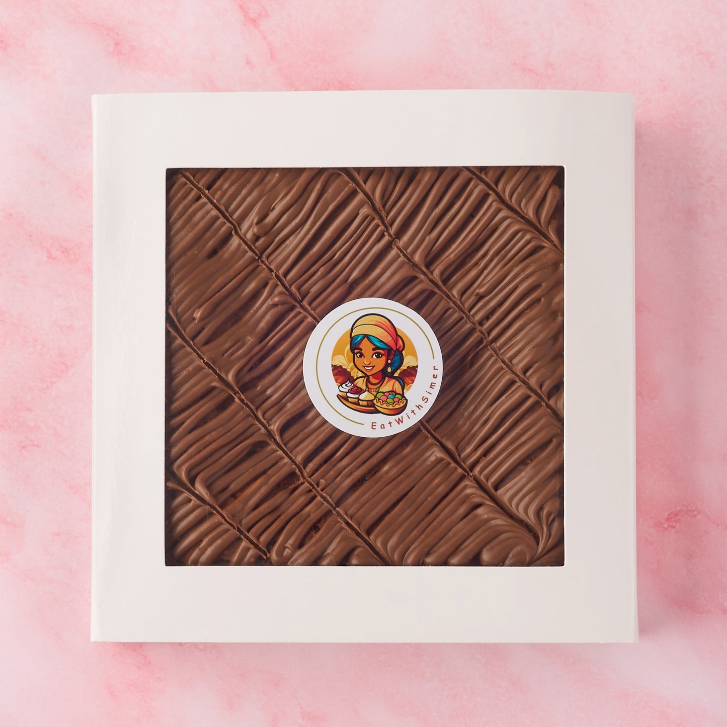 Whole eggless chocolate brownie slab in white gift box with window, made using Belgian chocolate