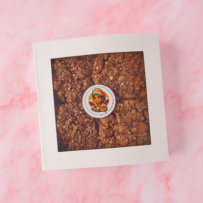 Chocolate oat cookies in a neatly packed gift box with window packaging