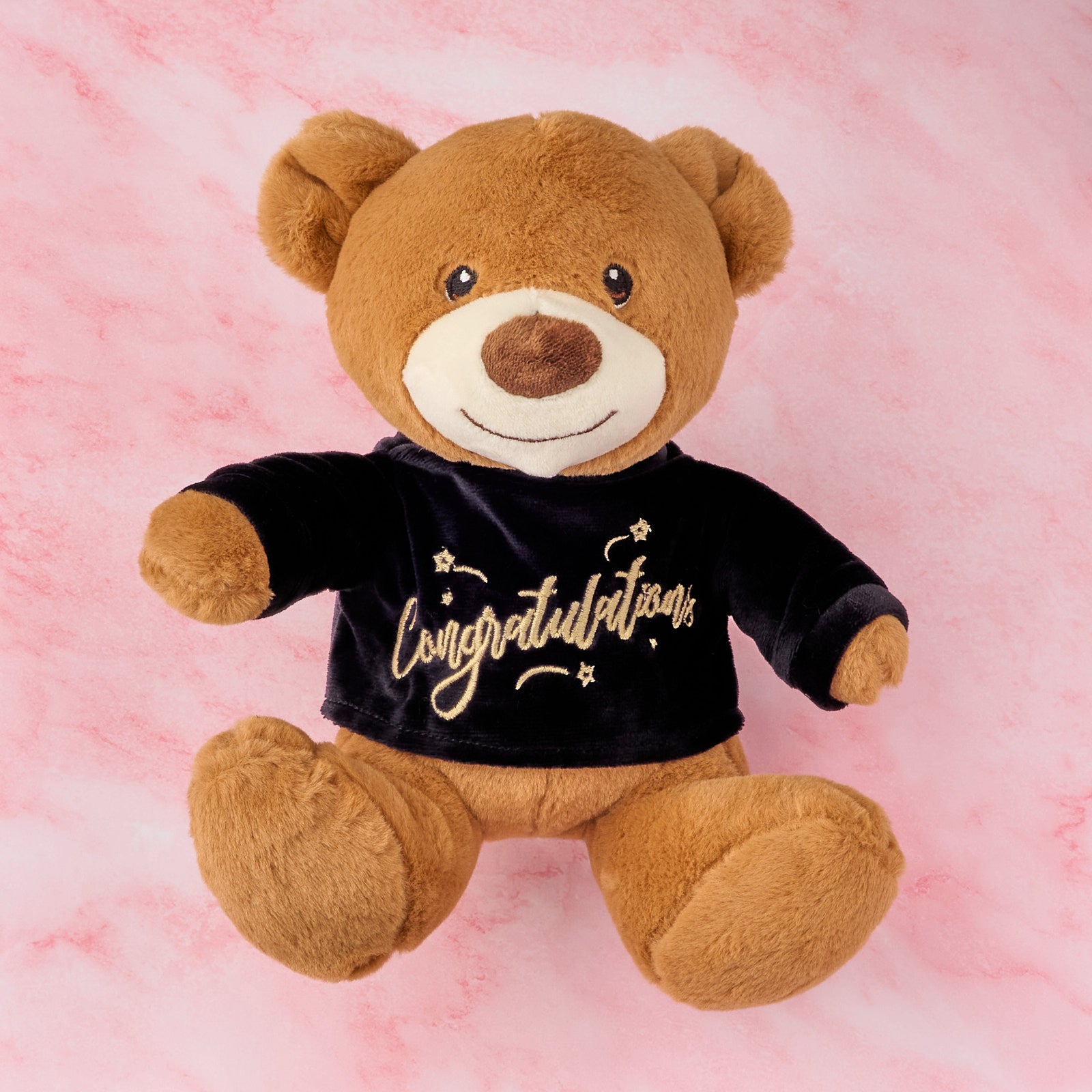 Soft congratulations teddy bear wearing a black sweater with gold “Congratulations” text, ideal as a gift add-on for hampers and dessert boxes