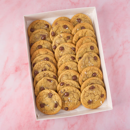 Eggless choco chip cookies in a 27 piece box, made with dark couverture chocolate and finished with salt flakes