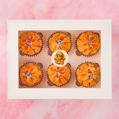 Eggless cupcakes in Sydney presented in a 6 piece box with vanilla buttercream and colourful sprinkles