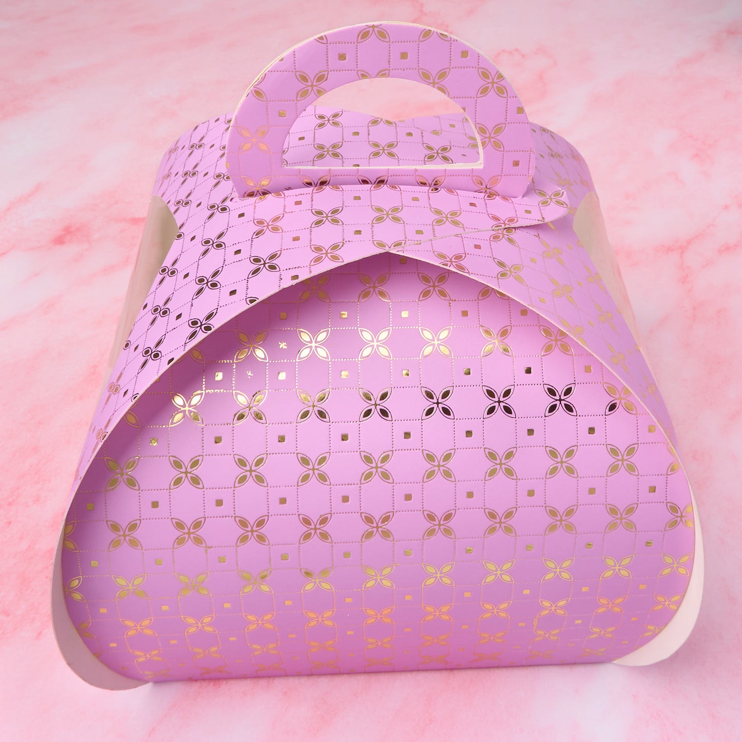 Purple gift cake box with clear window sides and sturdy handle, closed view