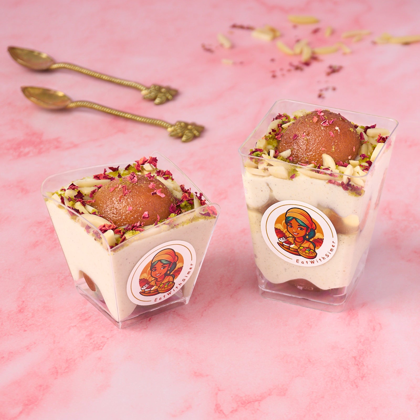 Gulab Jamun Rabdi Mousse Dessert Cups layered with gulab jamun and rabdi-style mousse, topped with nuts and rose petals