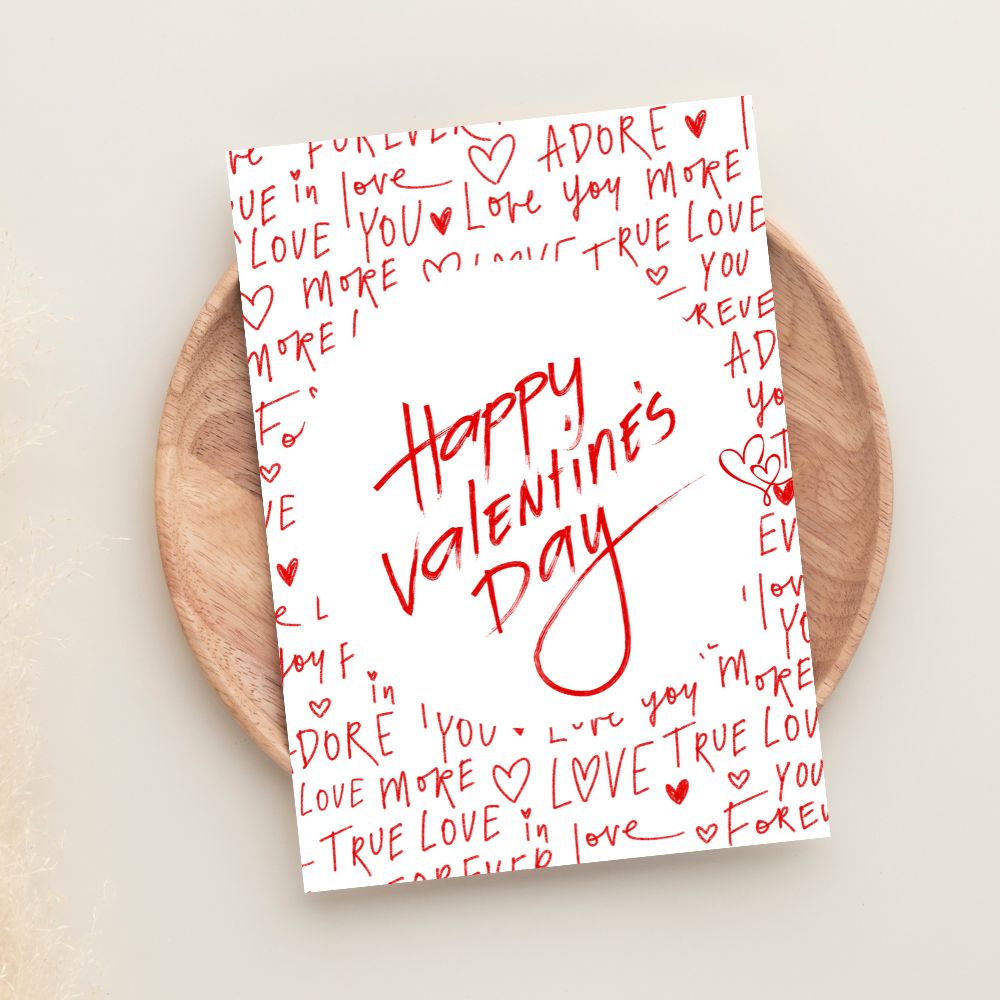 Valentine’s Day greeting card with handwritten love notes and romantic red design