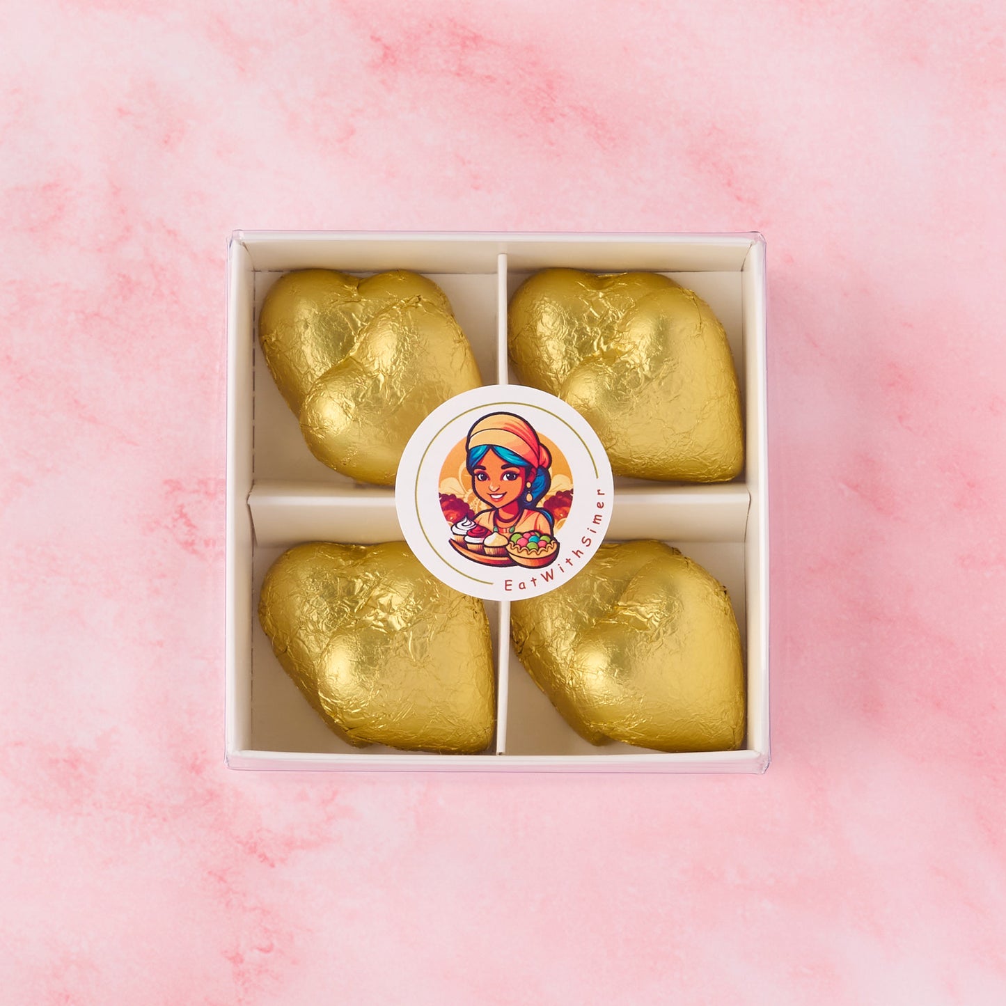 All gold heart chocolate box with 8 heart-shaped chocolates in a white gift box, premium chocolate gift suitable for weddings and corporate gifting