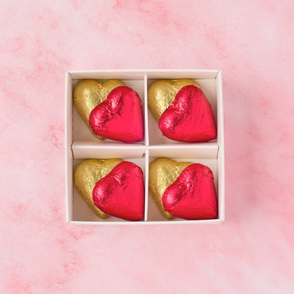 Open red and gold heart chocolate box showing 8 heart-shaped chocolates, premium chocolate gift box ideal for Valentine’s Day, anniversaries and dessert gifting