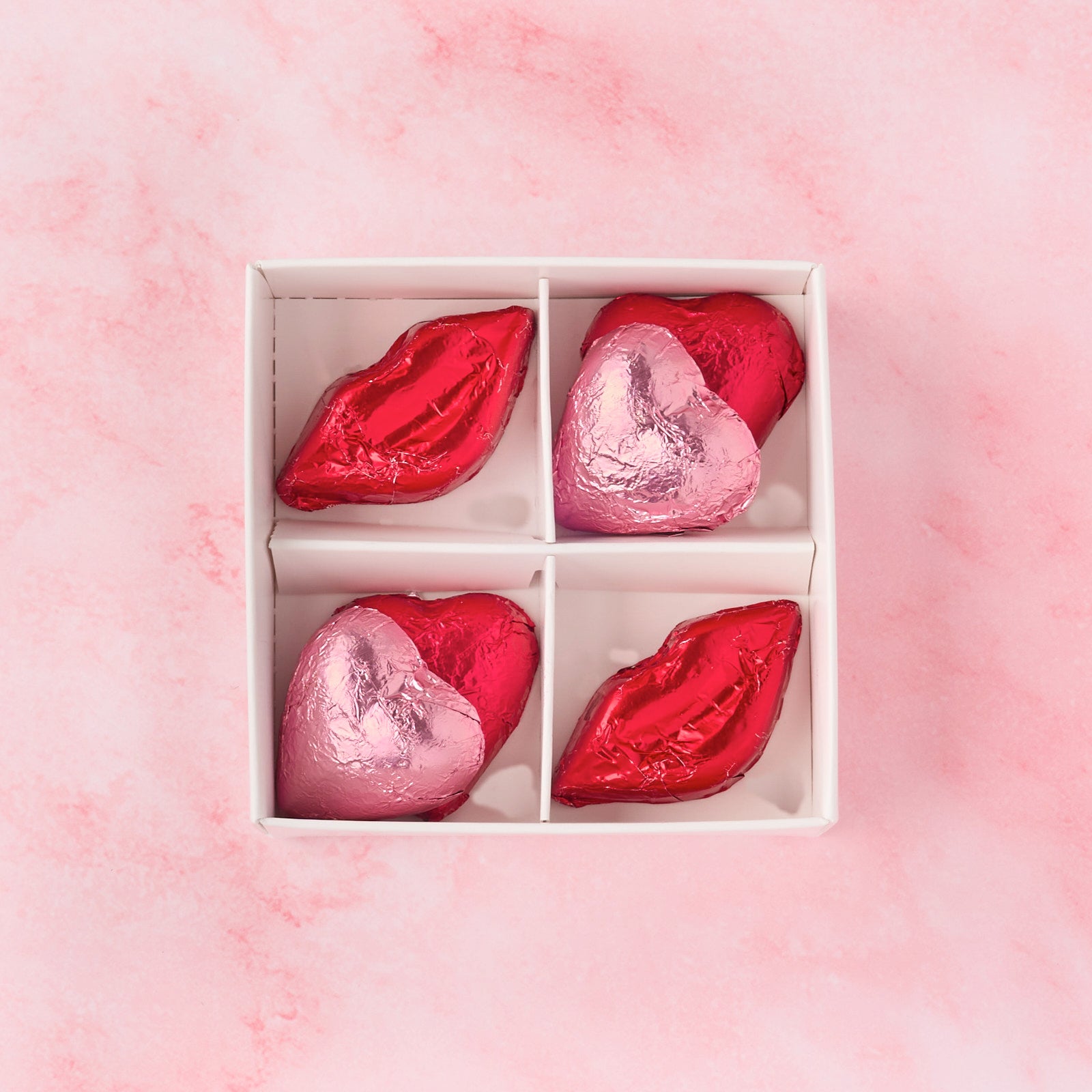 Open hearts and lips chocolate box with 8 foil wrapped chocolates including heart and lip shapes, chocolate return gift idea in Australia