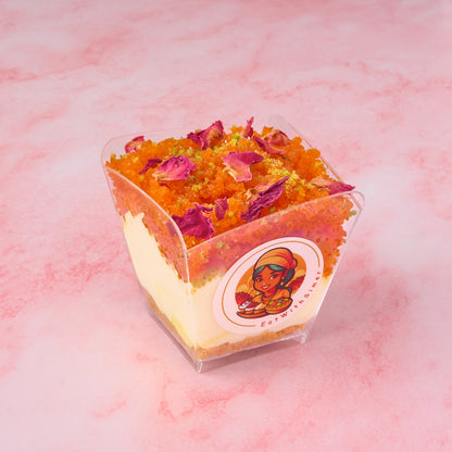 Indian-inspired Motichoor Cheesecake Mousse dessert cup with cream cheese mousse and festive topping