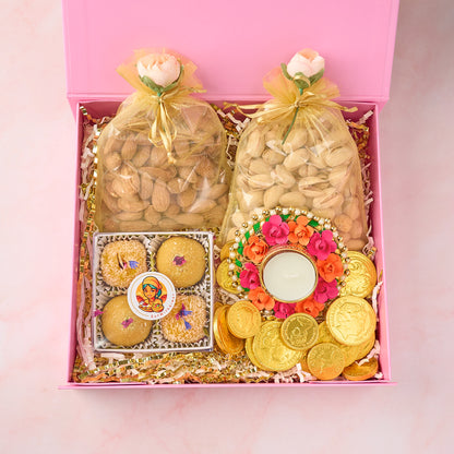 Indian sweets and nuts hamper with Mango Coconut and Besan Laddoos, roasted nuts and gold coin chocolates