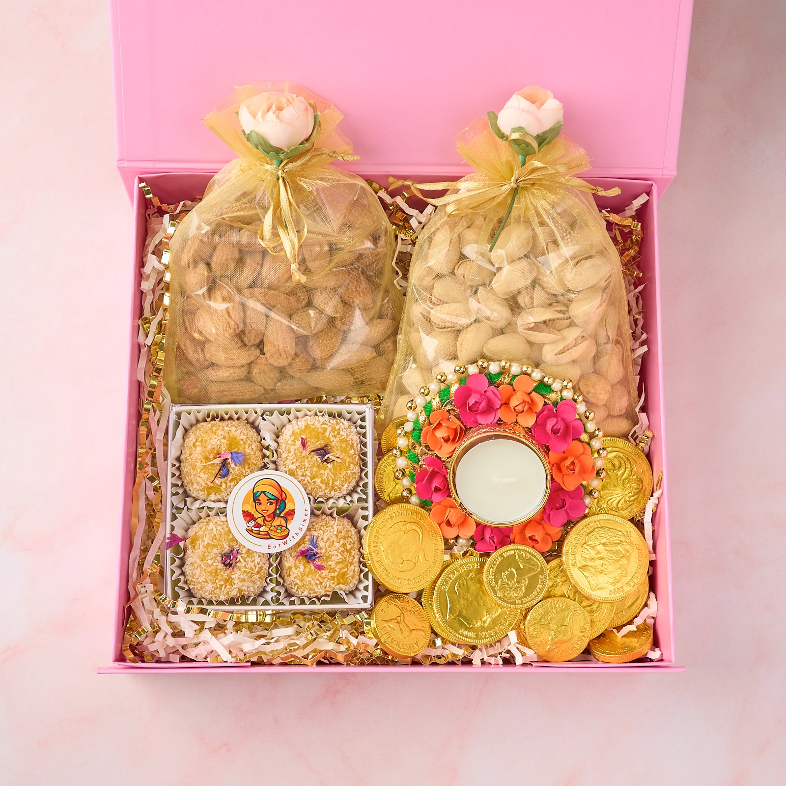 Indian sweets and nuts hamper with Mango Coconut Laddoos, roasted almonds, pistachios and gold coin chocolates