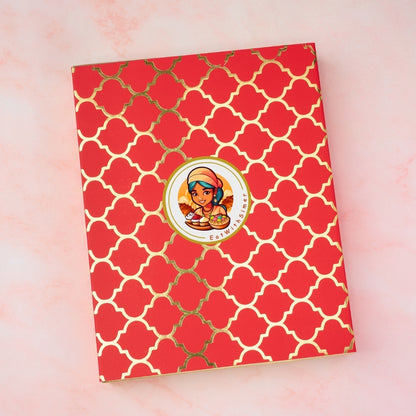 Red gift box with gold pattern and EatWithSimer logo