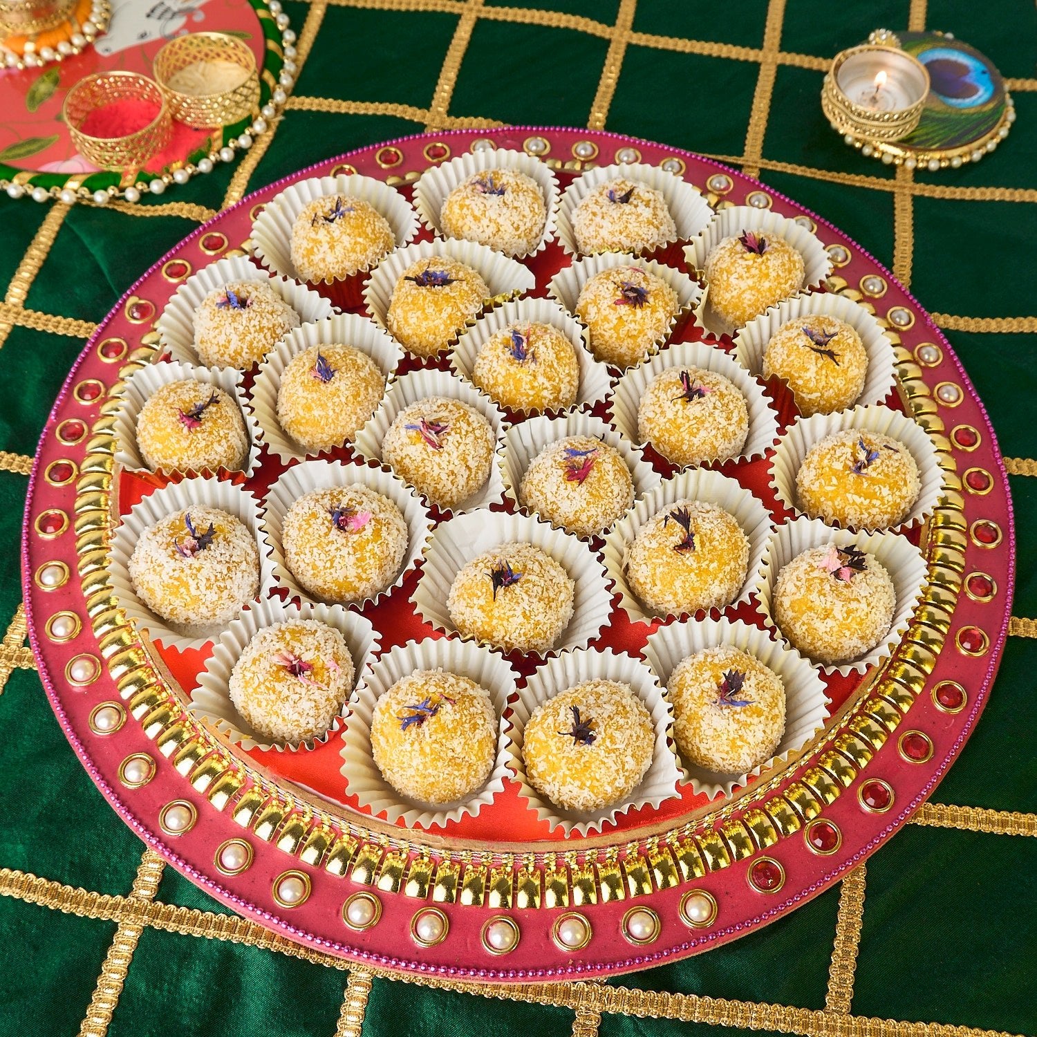 Mango Coconut Laddoo served on a platter tray for Indian sweet gifting and celebrations in Australia