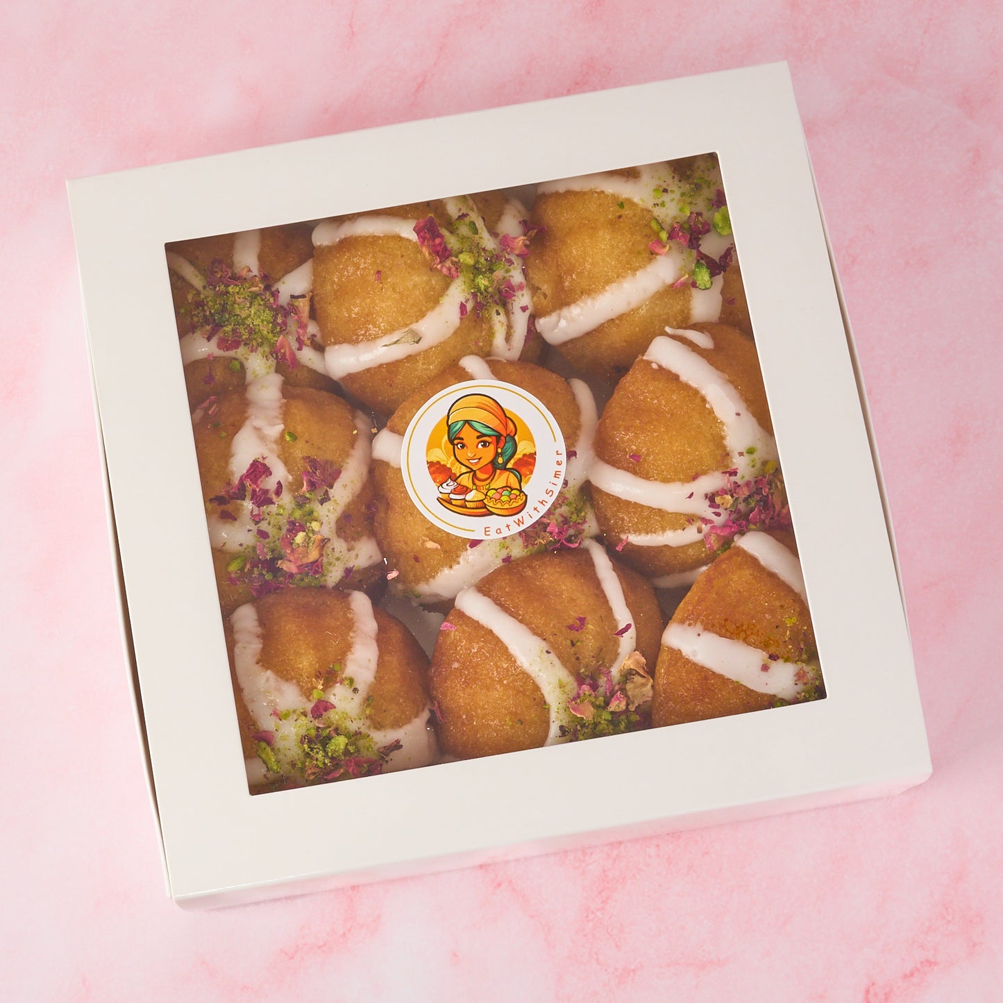 Branded gift box of eggless mini gulab jamun cakes modern Indian sweets by EatWithSimer