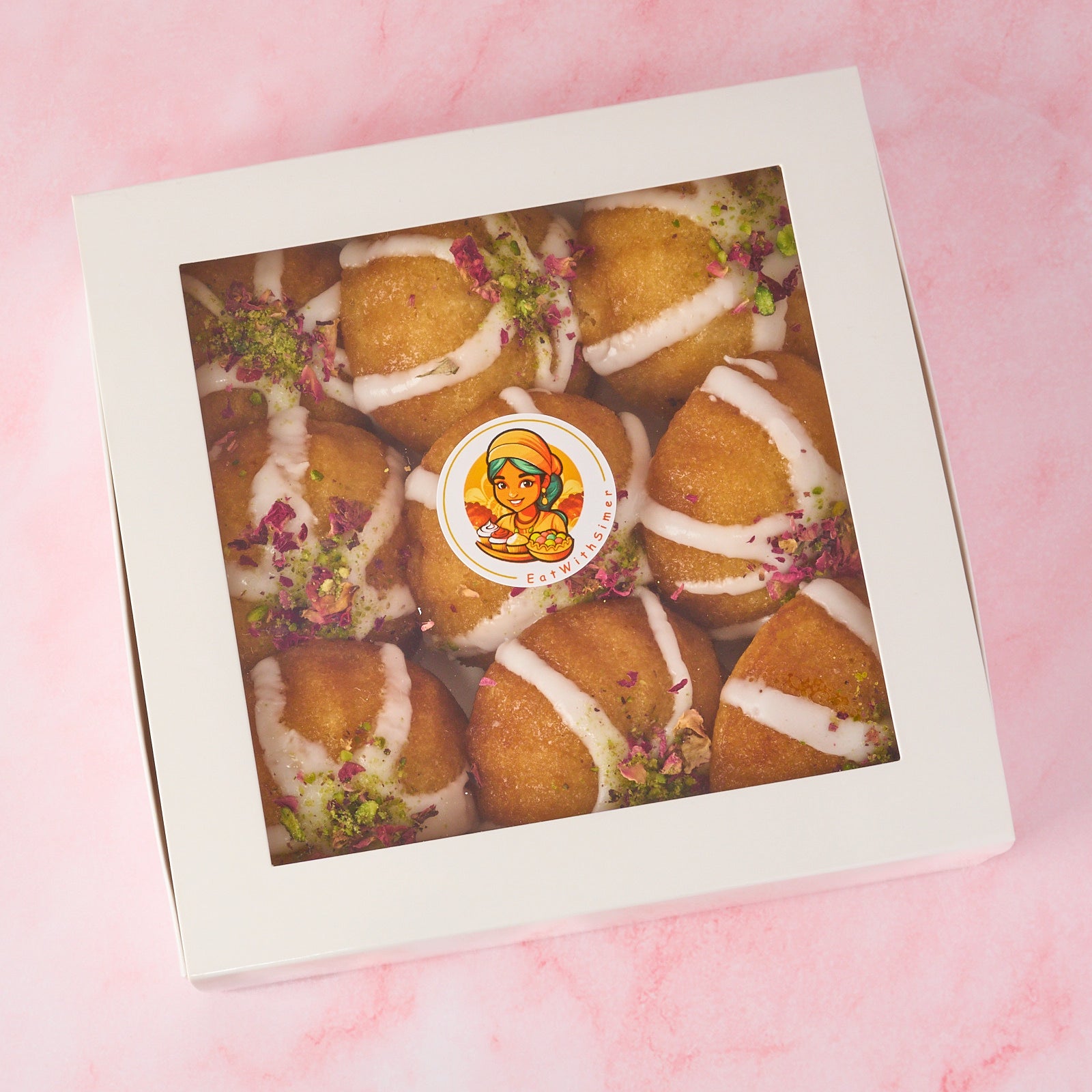 Branded gift box of eggless mini gulab jamun cakes modern Indian sweets by EatWithSimer