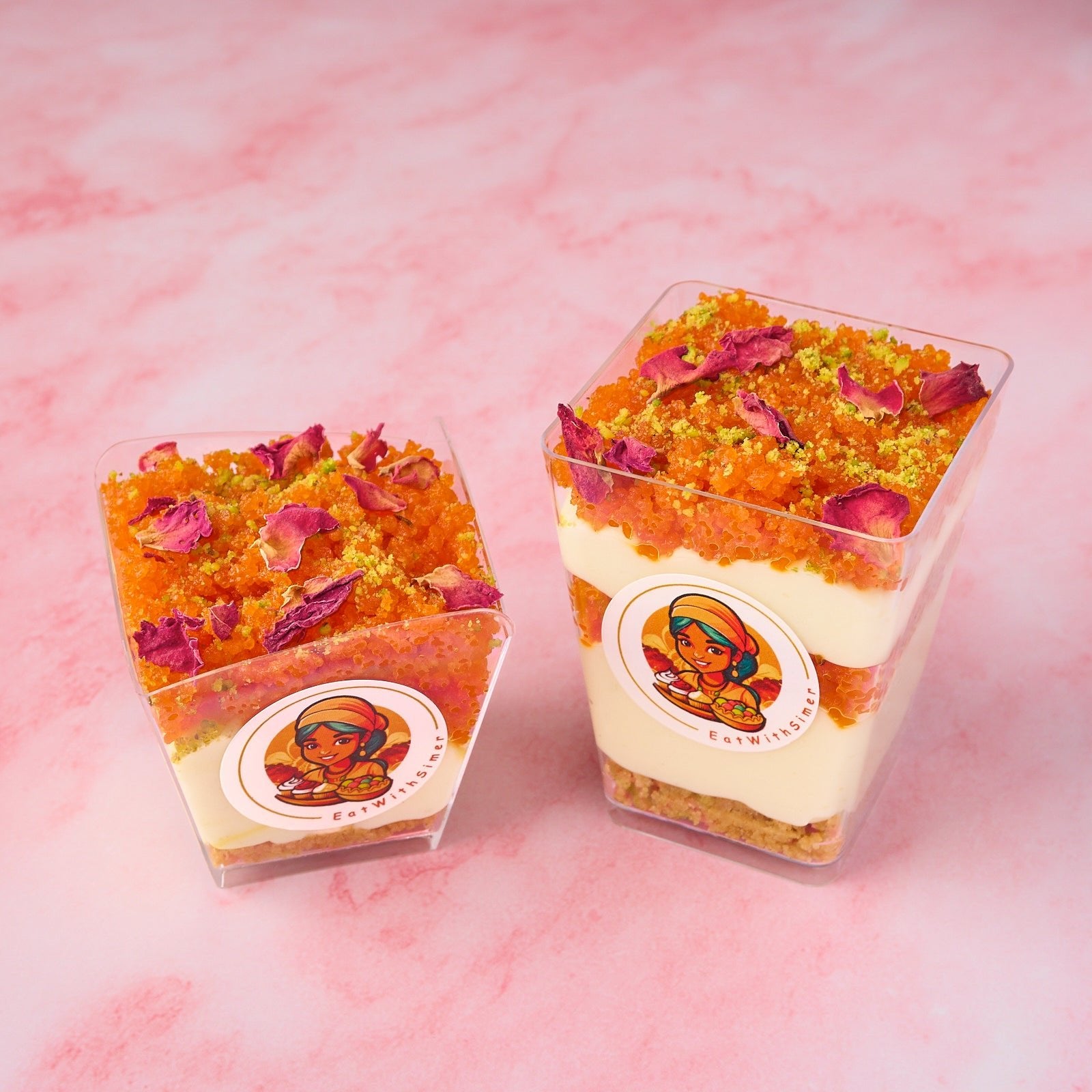 Layered Motichoor Cheesecake Mousse Cups topped with motichoor laddoo crumb and dried rose petals, Indian-inspired dessert cups for weddings and events in Sydney