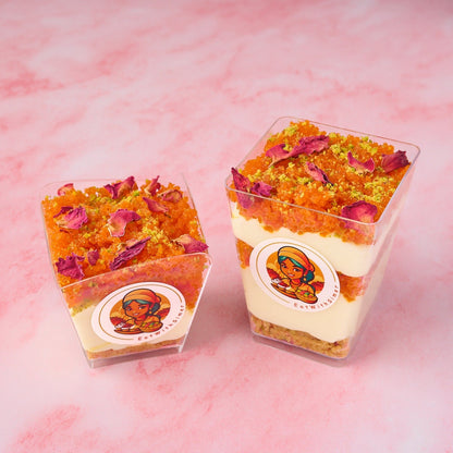 Layered Motichoor Cheesecake Mousse Cups topped with motichoor laddoo crumb and dried rose petals, Indian-inspired dessert cups for weddings and events in Sydney