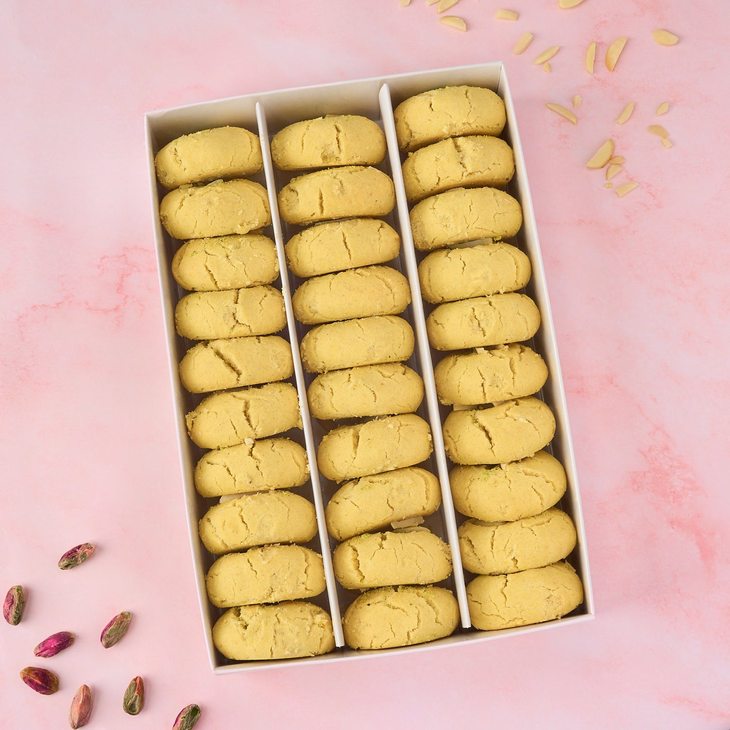 Top view of 30 piece Nankhatai biscuits arranged neatly in a gift box