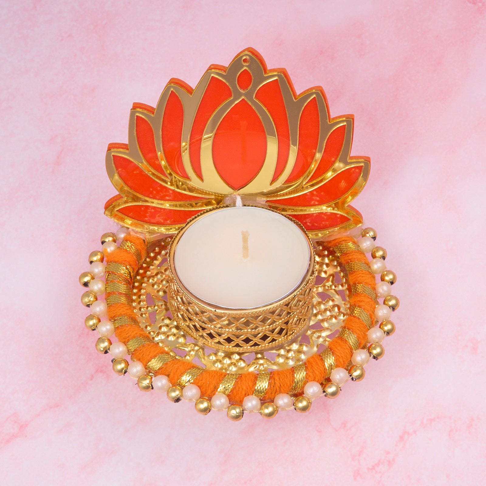 Orange lotus tealight holder with gold and pearl decorative details