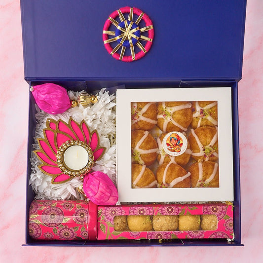 Indian gift hamper Padma with premium Indian sweets, lotus decor and navy keepsake box