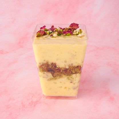 Layered Pistachio Kheer Trifle Cup in Sydney with visible rice pudding and pistachio cake crumble layers in clear dessert cup