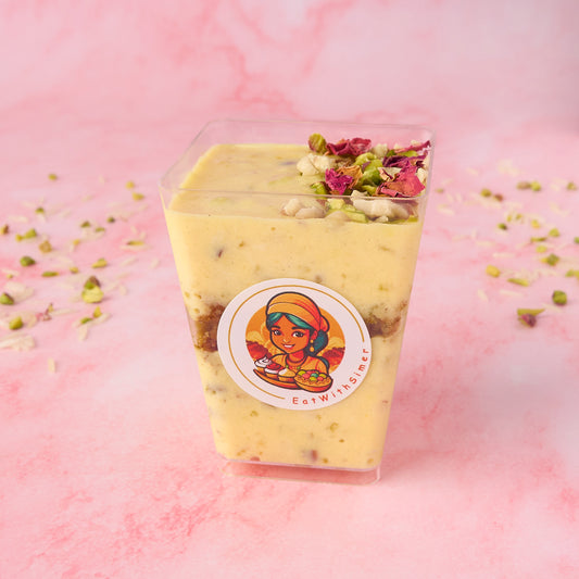 Pistachio Kheer Trifle Cups layered with saffron cardamom kheer and pistachio cake crumble topped with nuts and rose petals in Sydney