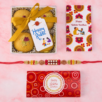 Rakhi Gift Pack with 4 Besan Laddoos, Swastika & Om Rakhi, message card and wrapped chocolate bar