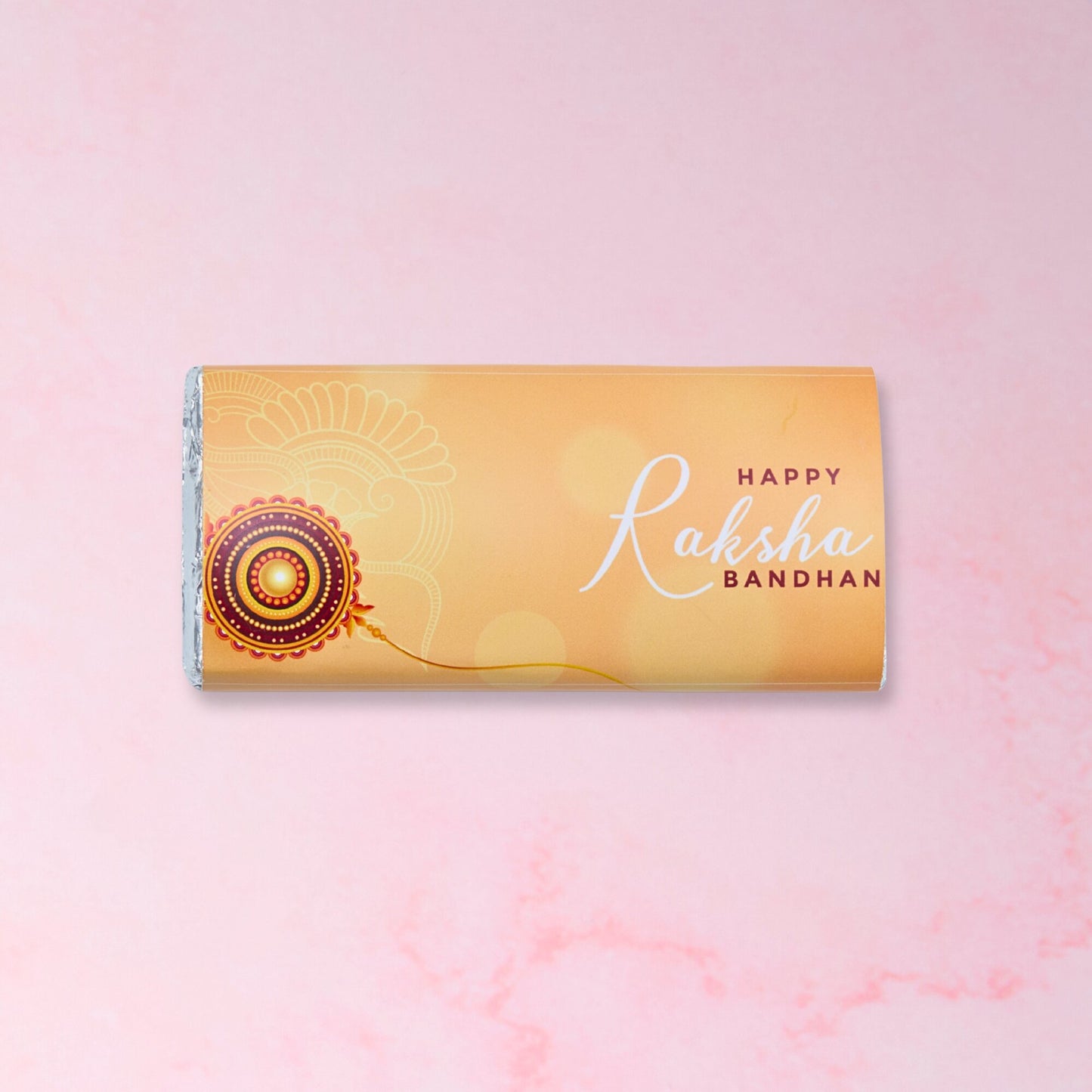 Raksha Bandhan chocolate bar with gold Rakhi wrapper