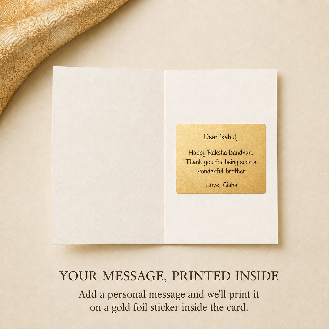 Open greeting card showing a personalised message printed on a gold foil sticker inside