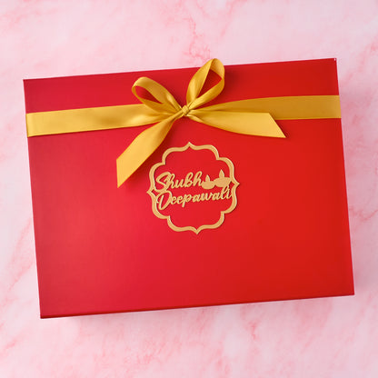 Red keepsake magnetic Diwali hamper box with golden ribbon and Shubh Deepawali charm