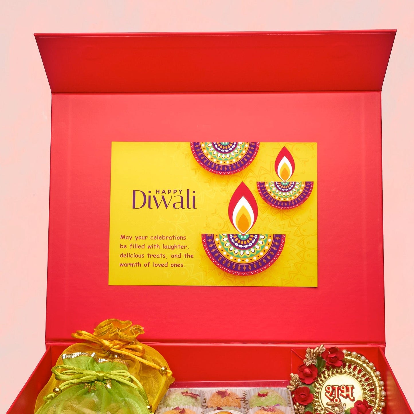 Saugaat Diwali hamper with A5 Diwali card on red keepsake magnetic box lid